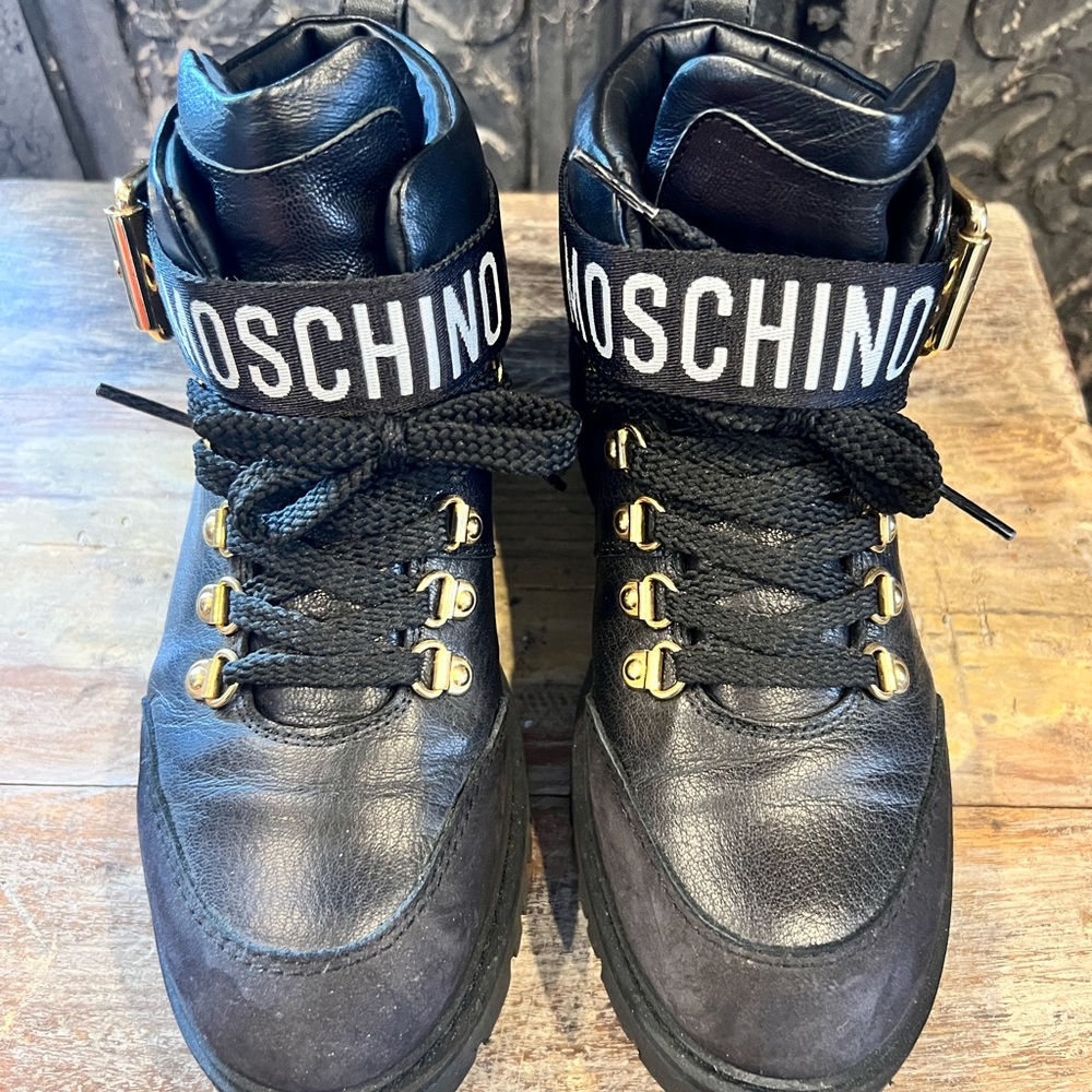 Super cute Moschino boots! Size 37/US 7. Black leather, suede & gold hardware.